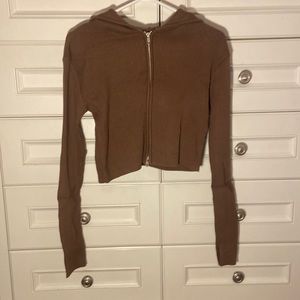 Tighter Cropped Zip Up Hoodie. From Brandy Melville
